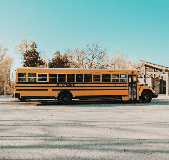 Yellow school bus offering students back to school activities. Credit Renan Kamikoga