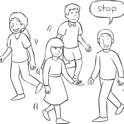 Four people moving about an area with one person saying Stop as part of energiser Walk & Stop
